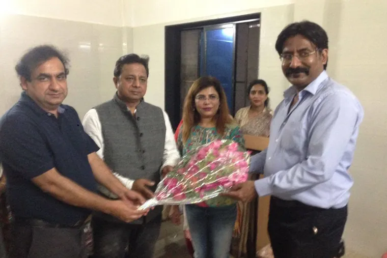 Felicitated at a conference workshop