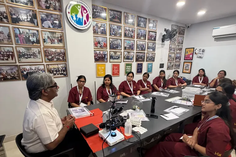 Teaching a full table, microscope between them