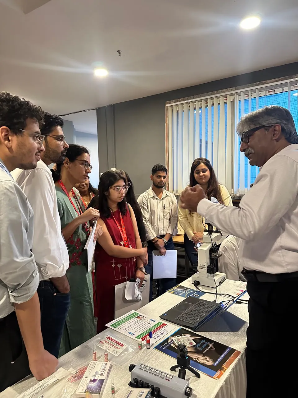 Sperm preparation technique explained at the Cell Mate demonstration station, FOGSI Jaipur 2026