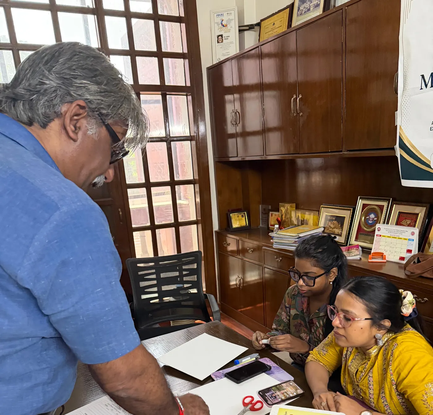 Sperm processing technique being demonstrated to gynaecologists during andrology training at their own centre